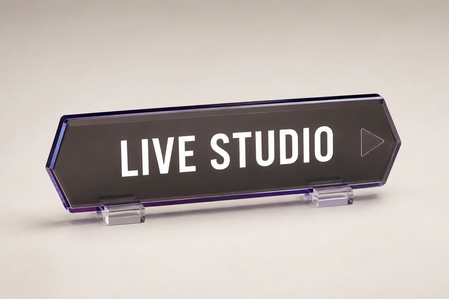 Smoked acrylic streaming desk sign with translucent violet edges.